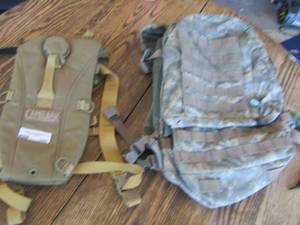 lot 340 image: camelback water backpack, green army bag