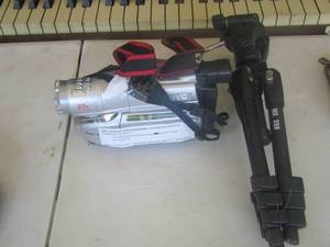 lot 362 image: jvc compact vhs camcorder model gr-sxm37u  no battery power missing power cord no cassette , camera tripod
