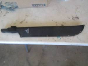 lot 379 image: GERBER machete and blade cover