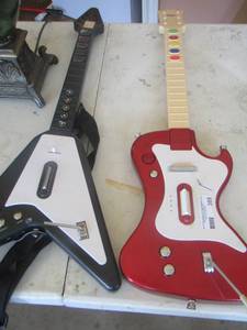 lot 389 image: qty 2 toy guitars