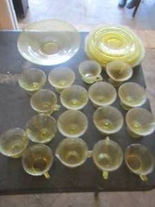 lot 599 image: yellow glass dishes, 17 handled cups, 1 bowl, various size square plates
