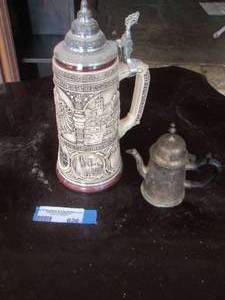 lot 626 image: handled Deutschland stein, handled metal mini tea pot