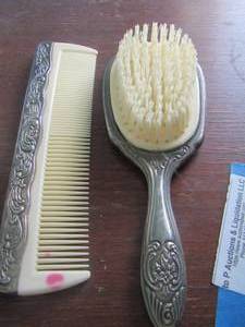 lot 618 image: silver plate hair brush and matching comb