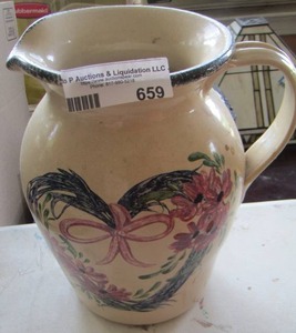 lot 659 image: handled pitcher