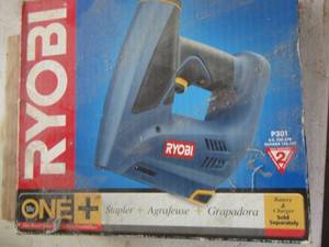 lot 664 image: Ryobi stapler in original box