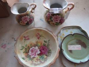 lot 675 image: decretive tea cups and plates