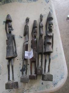 lot 677 image: carved wooden totems qty 5