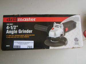 lot 703 image: drill master 4-14 angle grinder new