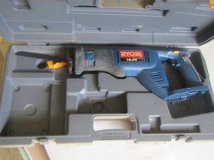 lot 711 image: Ryobi Skil saw in case  Battery operated  - no battery