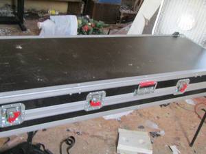 lot 1013 image: large empty music case on rollers- 5ft3 218