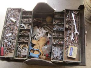 lot 1210 image: dbl sided tool box full of nails and such