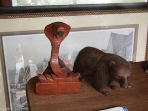 lot 1098 image: wooden bear- wooden cobra snake