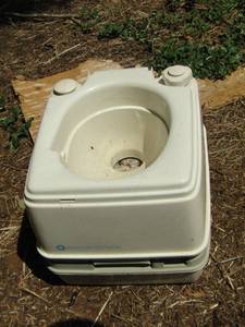 lot 1248 image: Portabe potty for rave travel trailer