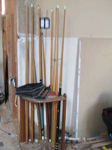 lot 1340 image: lot of various pool ques, pool sticks, pool stick holder