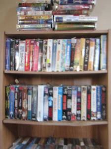 lot 1358 image: lot of various vhs tapes book shelf included