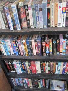 lot 1359 image: lot of various vhs tapes book shelf included