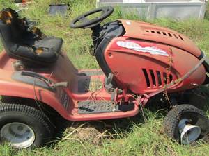 lot 1734 image: red riding lawn mower needs lots of work or could be scrap