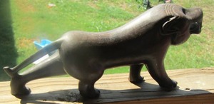 lot 1869 image: WOOD CARVING OF A BLACK PANTHER