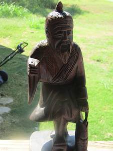 lot 1870 image: WOOD CARVED CHINESE MAN WITH KNIFE