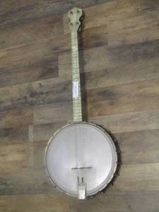 lot 1863 image: Remo weather king banjo 4 strings 1 broke