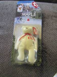 lot 745 image: Ronald McDonald ty beanie baby maple the bear