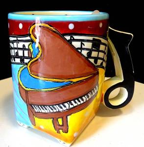lot 32 image: RHAPSODY CAFE HAND PAINTED PIANOMUSIC THEMED COFFEE MUG