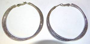 lot 86 image: LARGE SILVER HOOP EARRINGS AS SHOWN