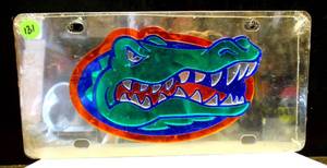 lot 131 image: NEWSEALED - Florida Gators NCAA Black Mirrored Laser Cut License Plate Craftique ($30 EBAY)