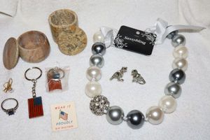 lot 125 image: Jewelry and key chains, see all photos for individual pieces