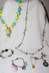 lot 126 image: Jewelry Disney themed, see all photos for individual pieces