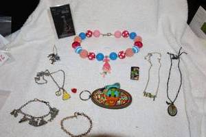 lot 128 image: Jewelry Disney themed, see all photos for individual pieces