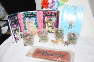 lot 130 image: Misc. kids lots Shrek toys, giant eraser, Purrfect notebook and more