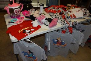 lot 45 image: Disney shirts, sleepwear, iPhone case, blanket, and toys, see photos