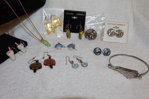 lot 52 image: Novelty Jewelry glass flip flop earrings, Marilyn Monroe post earrings and more