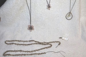 lot 61 image: Jewelry smoky string beads, clear stone pendant, pink stone beads