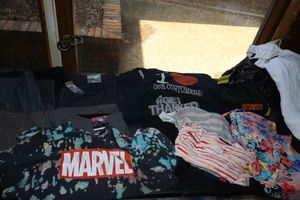 lot 186 image: 3XL clothes and womens swimsuits. Trousers with tags 18W.