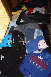 lot 182 image: Boys clothes and puffer jackets sizes 6-7 mostly. See photos