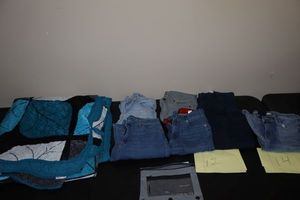 lot 184 image: Girls jeans sizes 12-14 and more. Plus blanket
