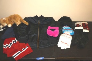 lot 188 image: Winter hats and gloves, socks, black jacket size Med, and plush cat