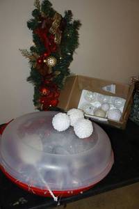 lot 190 image: Christmas decorations with wreath storage container and lighted door swag