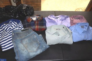 lot 249 image: Mens dress shirts and work shorts, see photos