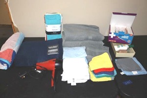 lot 248 image: Bathroom towels, hair dryer, syringes, see photos