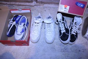 lot 49 image: Tennis shoes Vans hightops, White Nikes, Blue and white pair size 6,