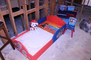 lot 41 image: Paw Patrol toddler bed and toy shelf as shown