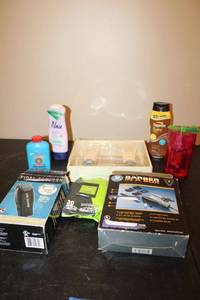 lot 213 image: Hair cutting kits and lotions