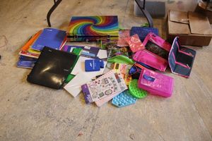 lot 211 image: School supplies and Pop Its fidget toys