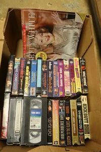 lot 244 image: VHS tapes and Betty White calendar