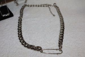 lot 92 image: Jewelry Safety pin themed