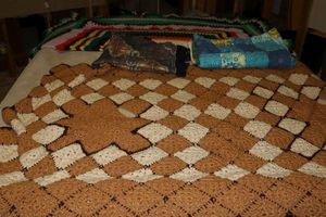 lot 171 image: Afghan blankets and quilt - some are half size