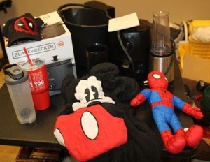lot 253 image: Kitchen items plus Dead Pool hat, Mickey hoodie and Spiderman toy